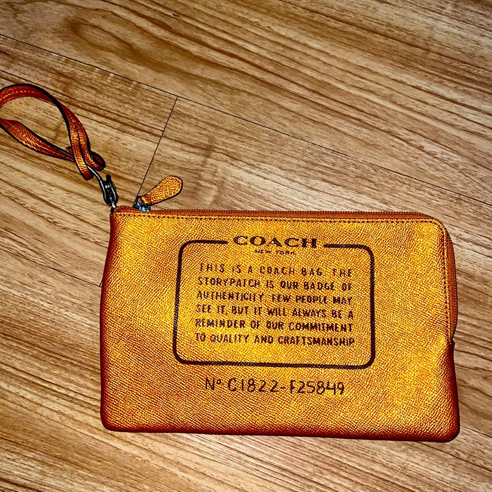 COACH Metallic Orange Wristlet Cosmetic Bag